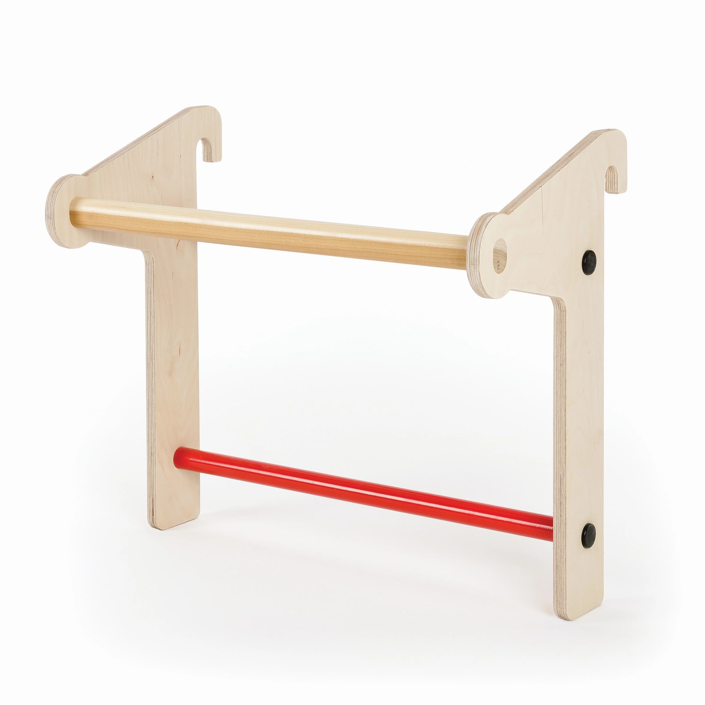 Plywood frame supporting a timber oval top bar and a steel lower bar for a wall-mounted exercise bar section.