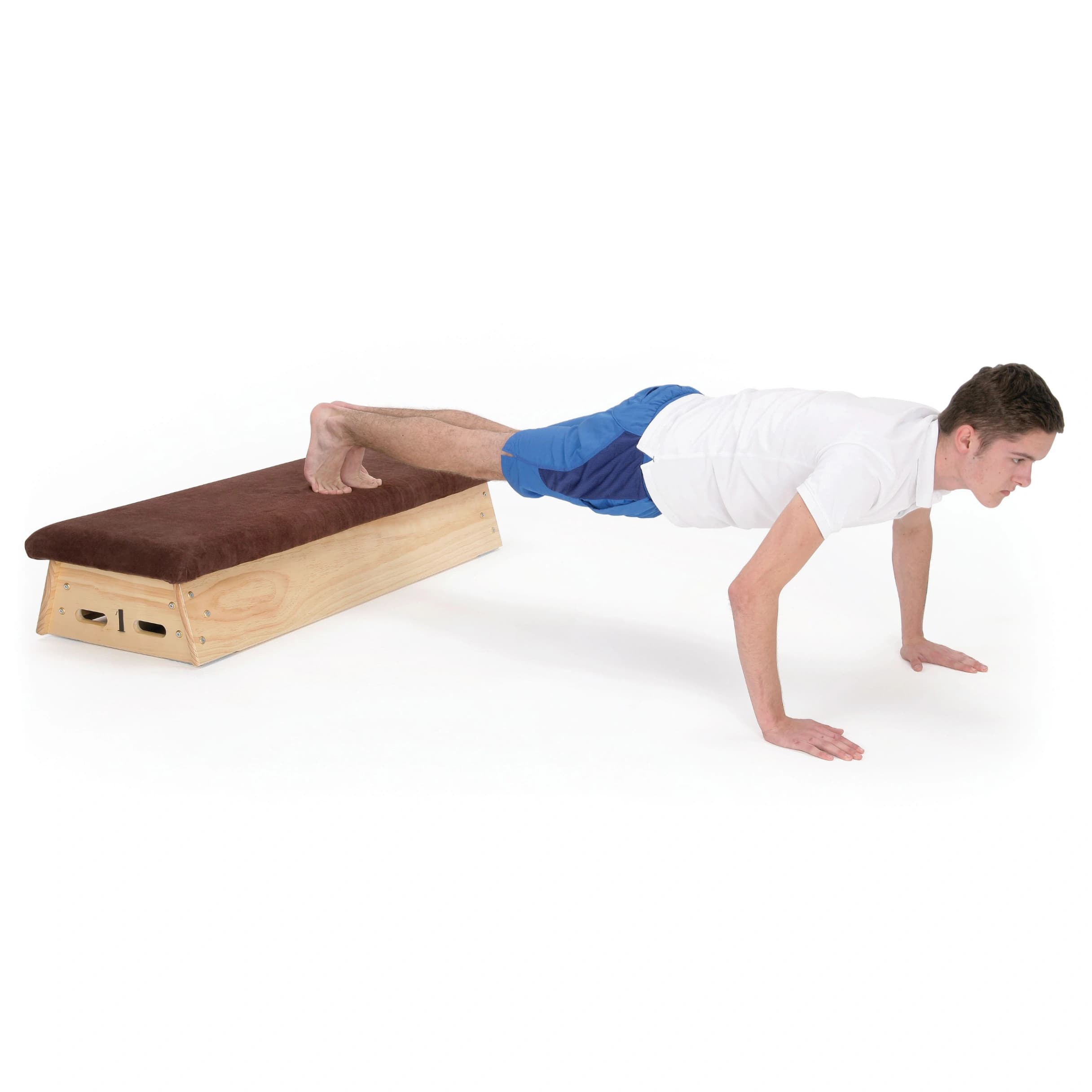 5-section timber vaulting box with quality hide top and castors, base marked 1, shown with a man bracing his hands on the floor.