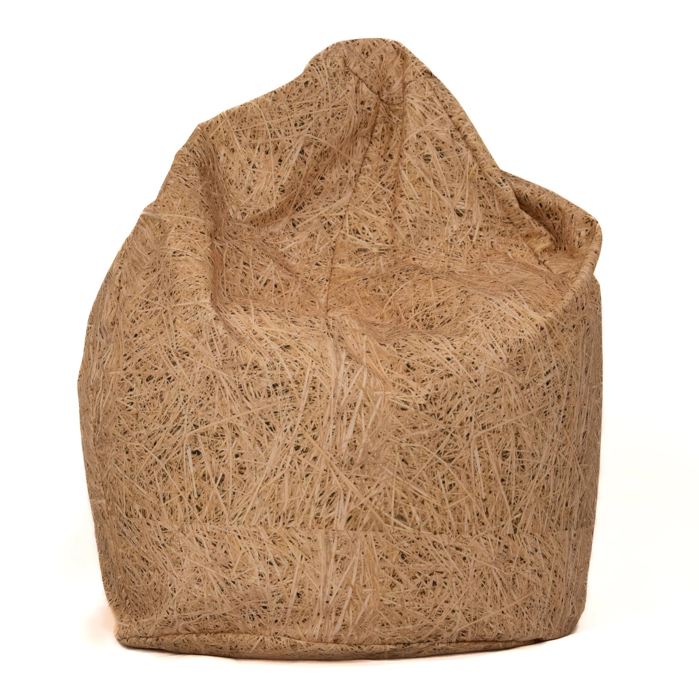 Slouchy bean bag with hay-print polyester outer cover featuring a straw-like nature print and relaxed upright seating shape.