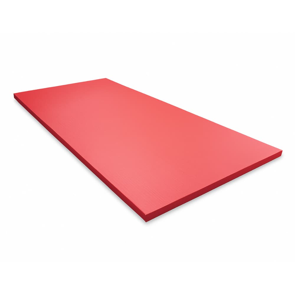 Red rectangular high-density foam mat with smooth surface on a white background.
